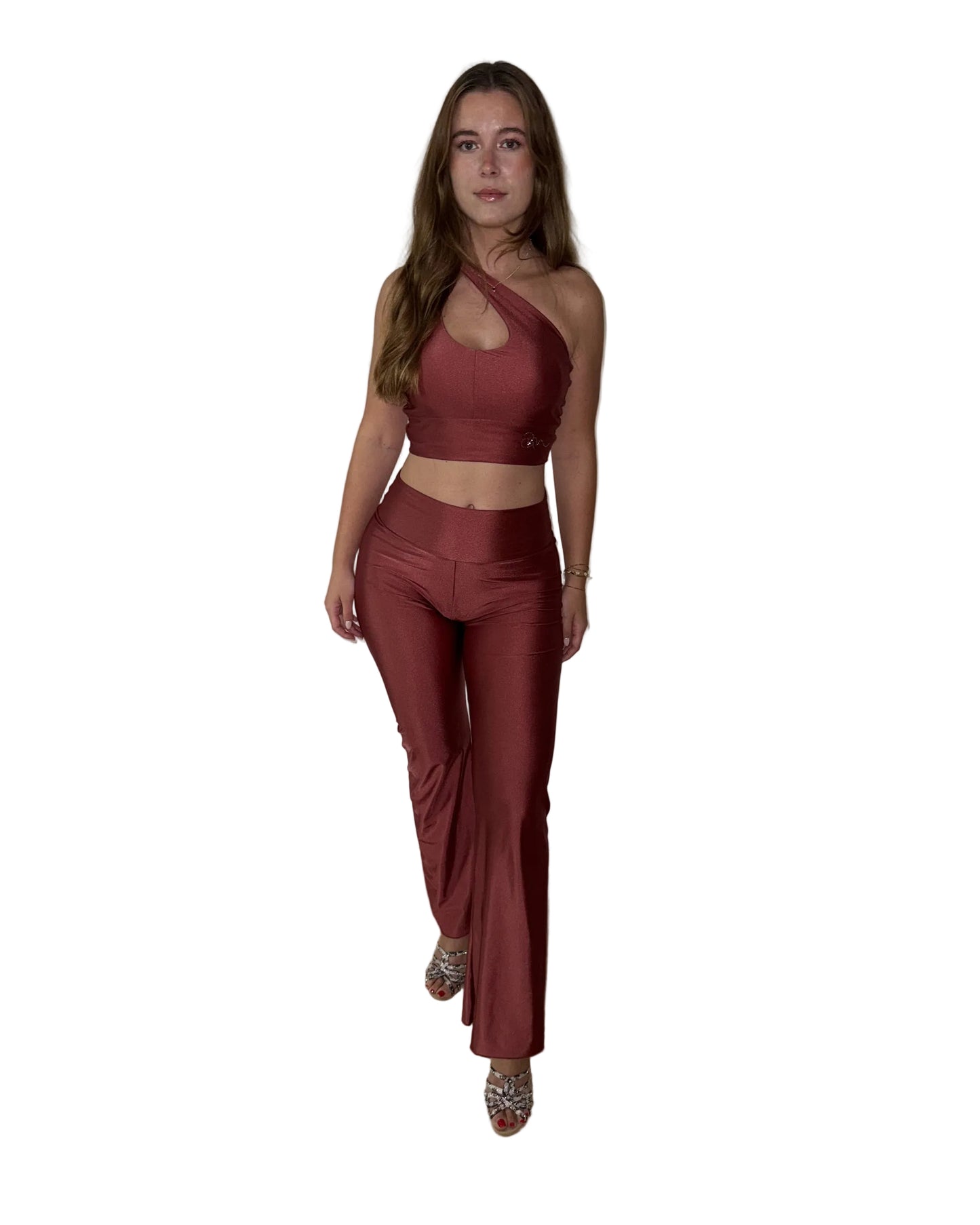Woman wearing Ama & Move Adjustable Top Mara and Flared Pants Alba in Ruby, dancewear