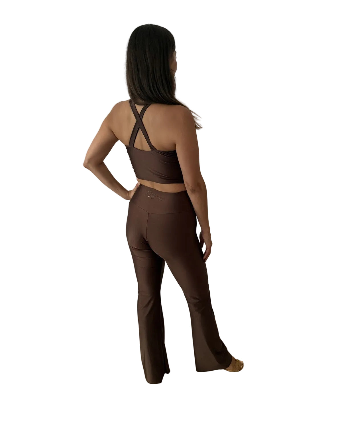 A woman is shown from behind wearing a matching dark brown dancewear set consisting of a strappy halter crop top and high-waisted flared pants gliter stones